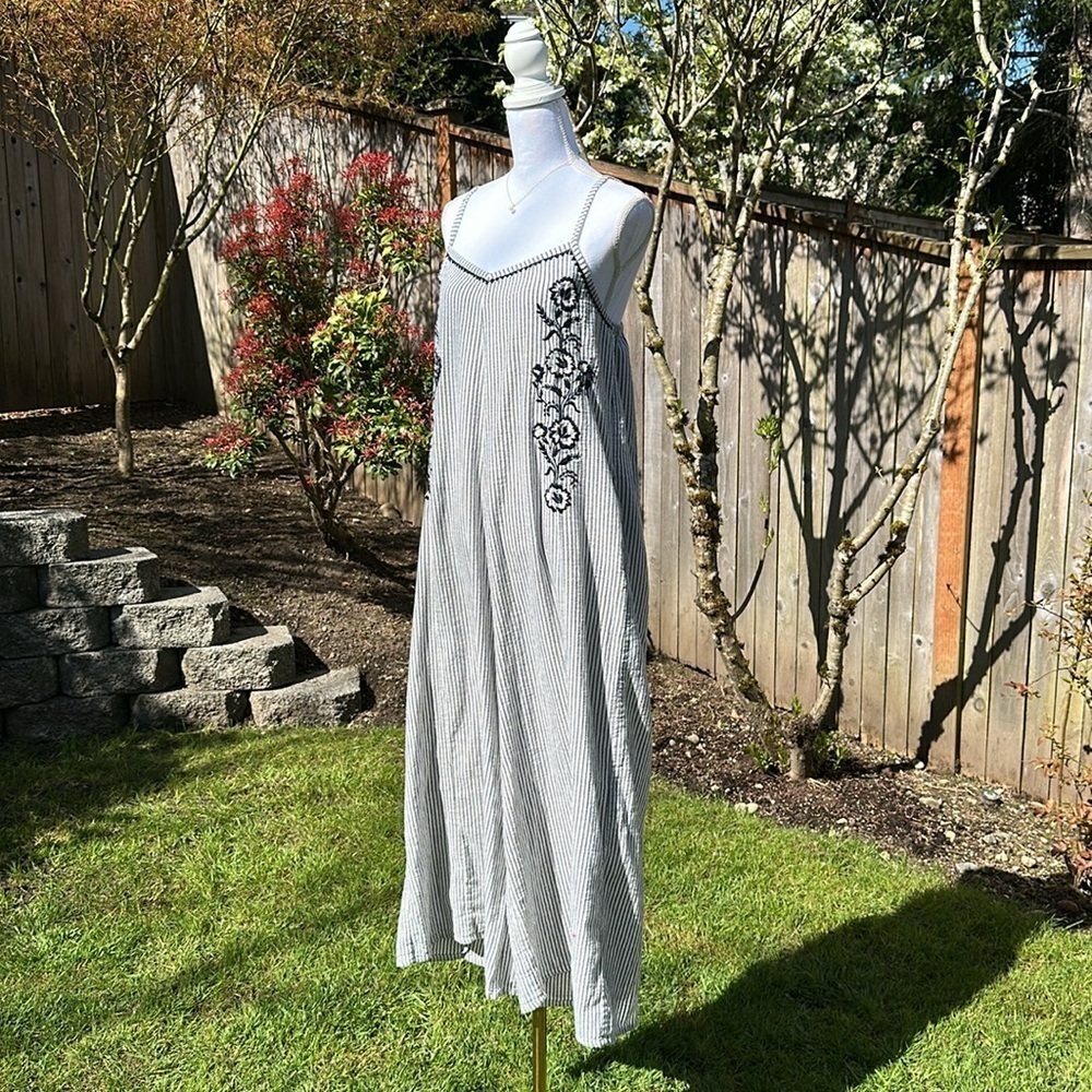 Spaghetti strap pinstripe wide leg jumpsuit with floral embroidery